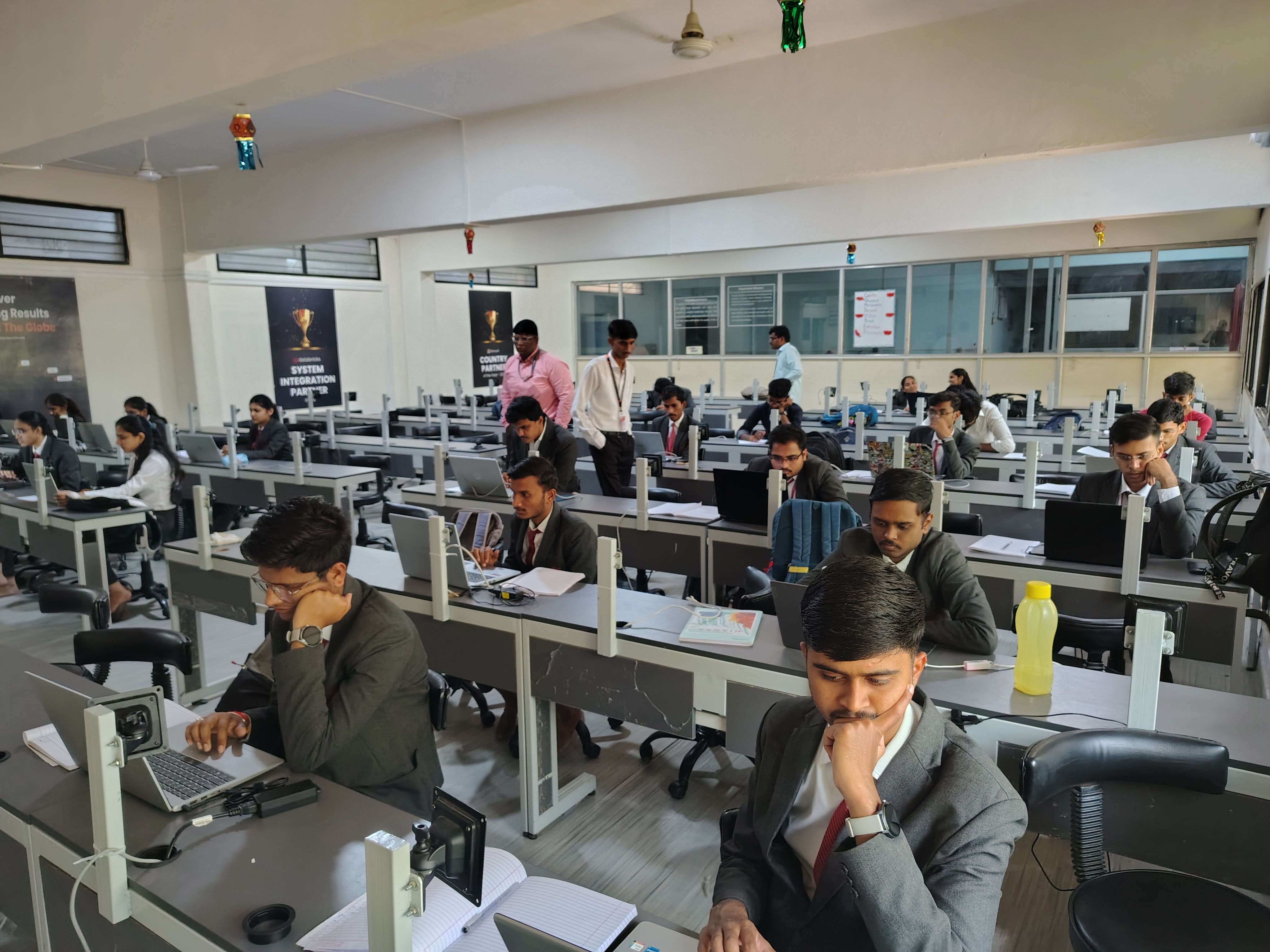 Engineering students participating in a technical session on Embedded Systems and IoT