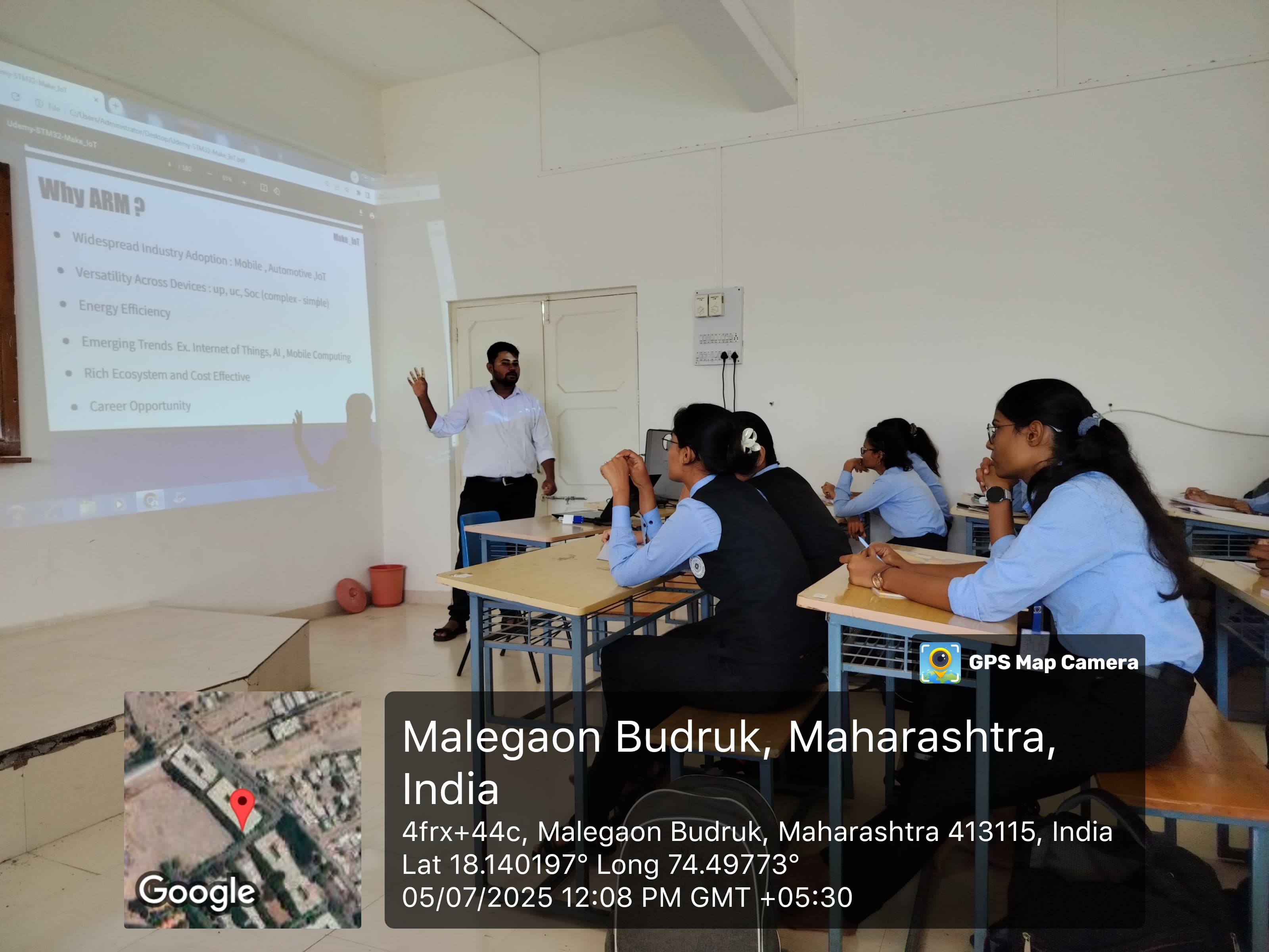 Students learning ARM Cortex-M4 architecture and STM32 controller concepts during a workshop