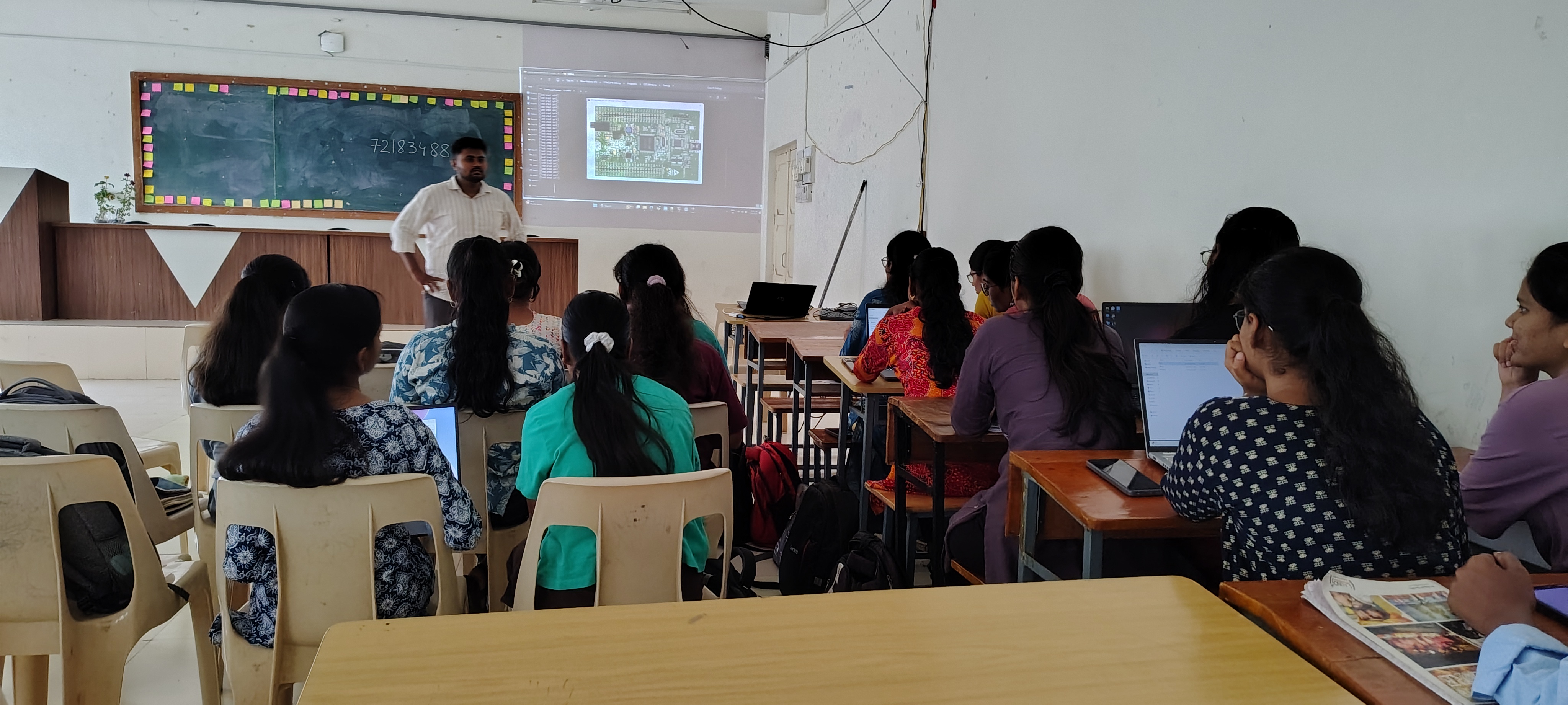Students attending a practical STM32 controller session with laptops and classroom demonstrations