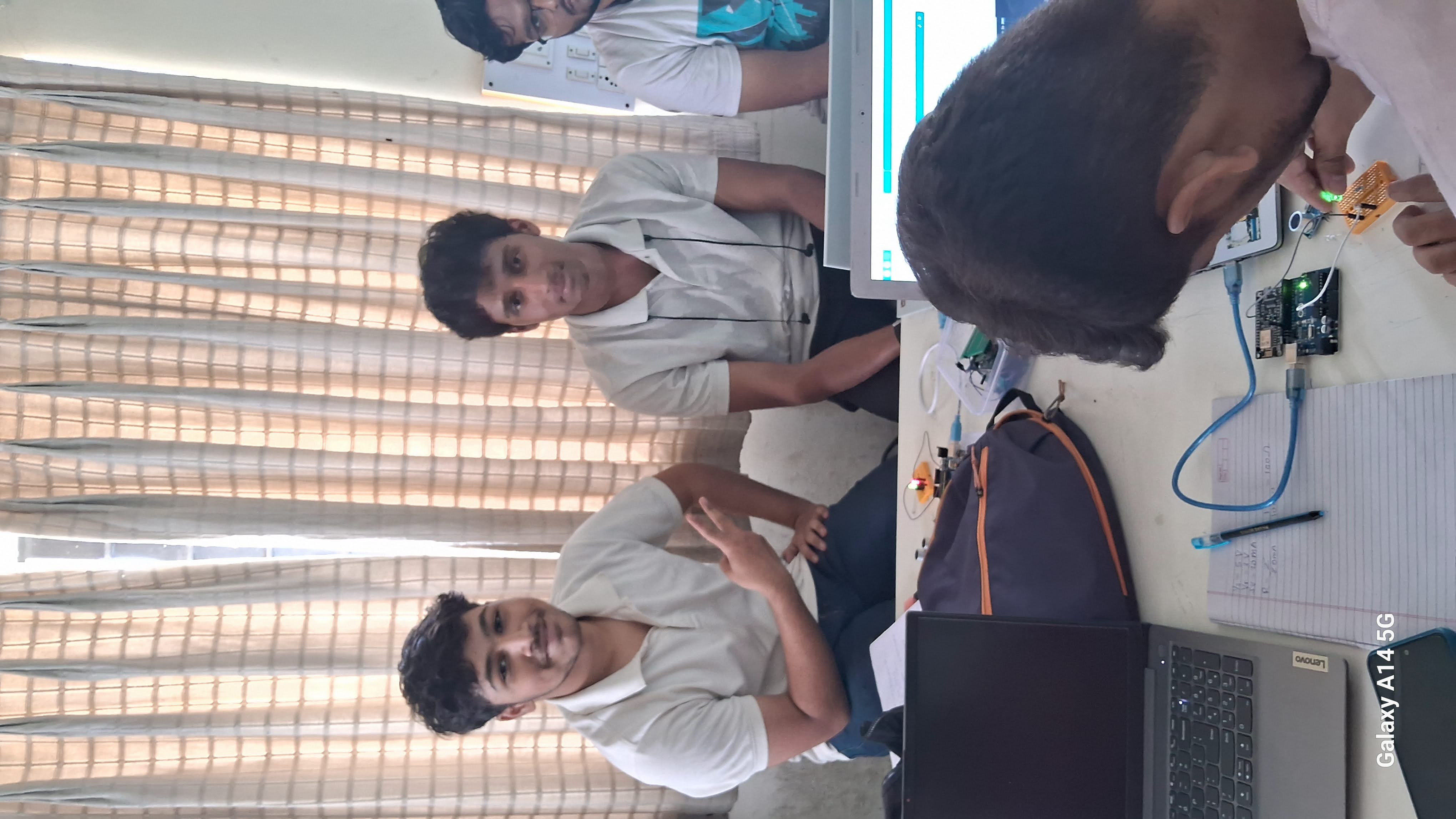 Engineering students working with Arduino hardware and electronic components during an IoT workshop in Pune