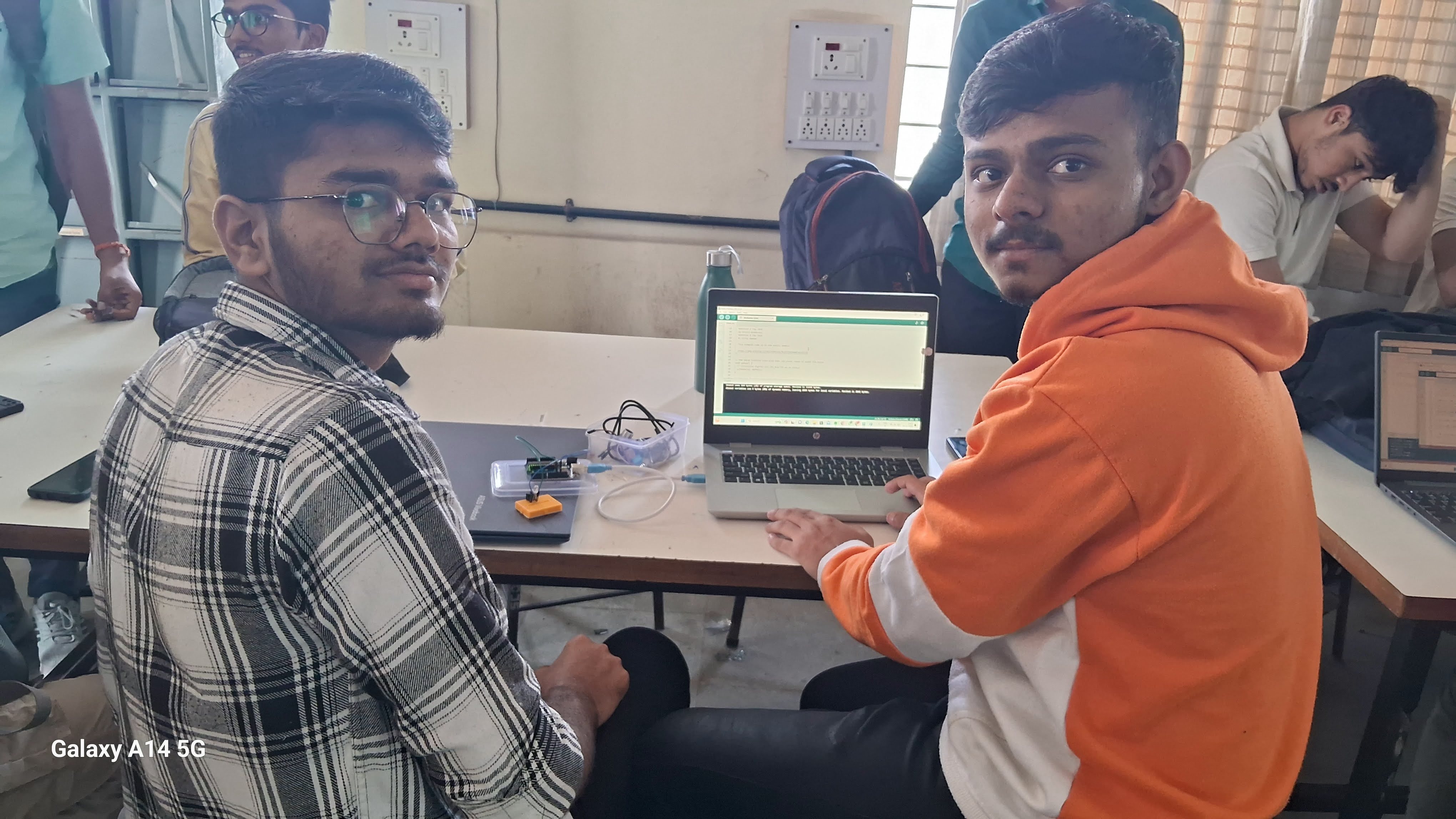 Engineering students building IoT projects using Arduino and ESP32 hardware