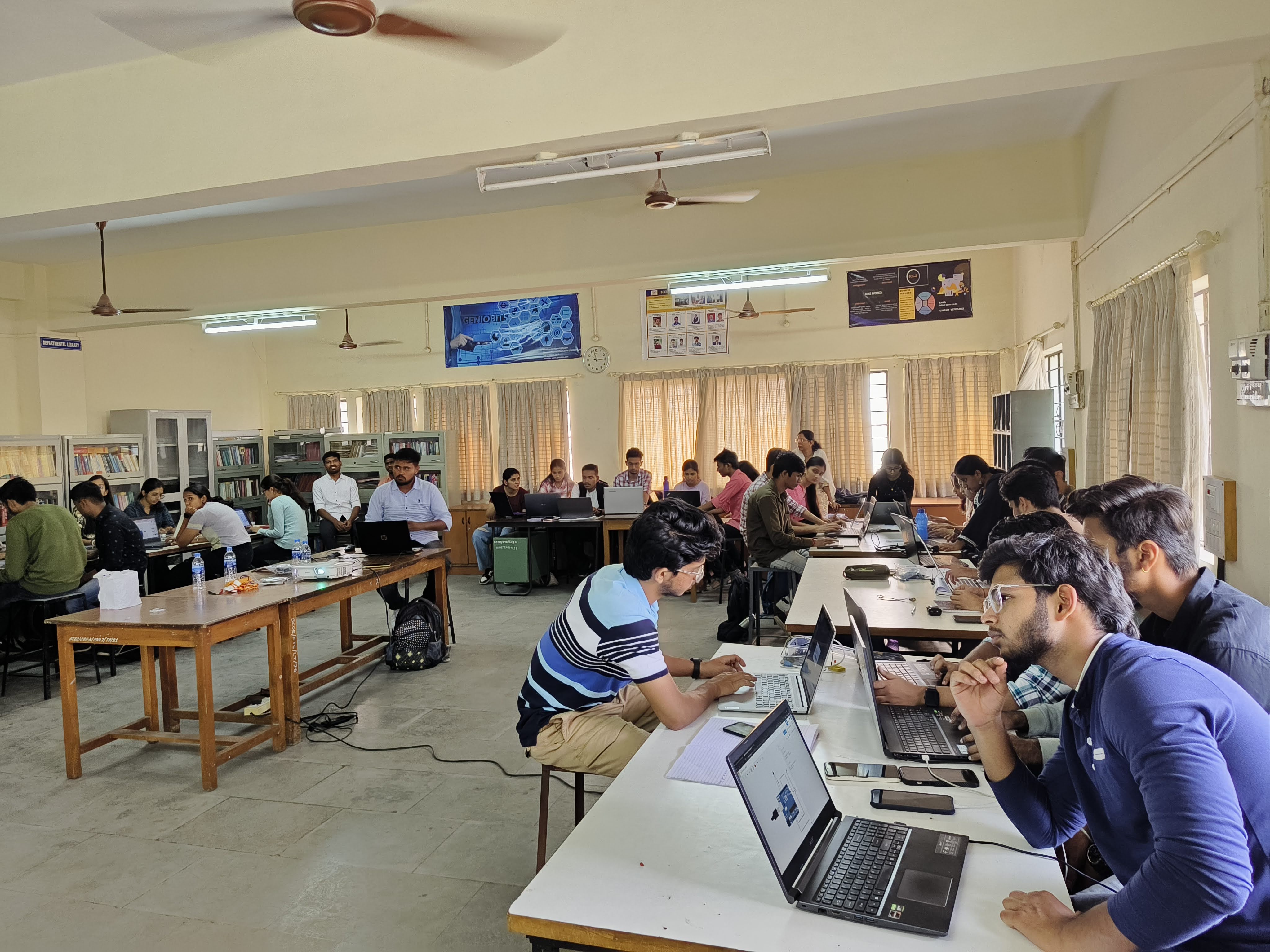 Students learning Arduino and ESP32 development during an IoT workshop at Sinhgad College of Engineering Pune